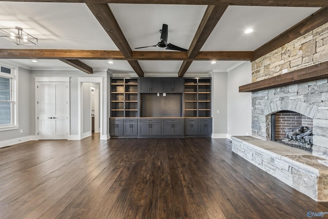 unfurnished living room featuring dark wood-style floors, a fireplace, recessed lighting, beamed ceiling, and baseboards