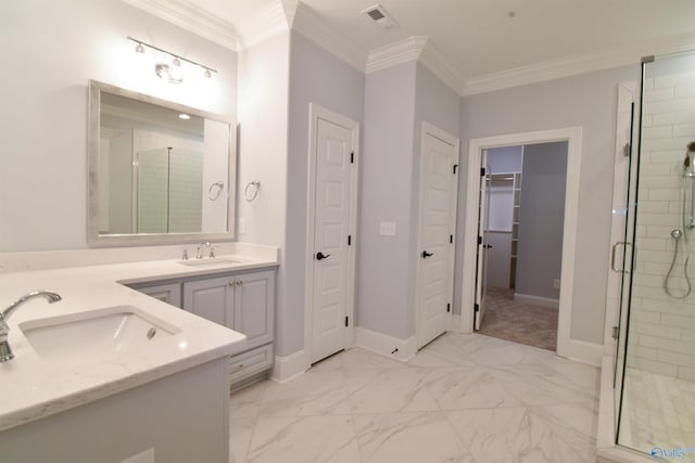 bathroom featuring crown molding, vanity, and a shower with shower door