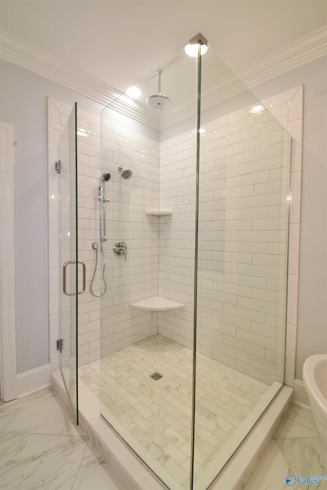 bathroom featuring walk in shower and ornamental molding