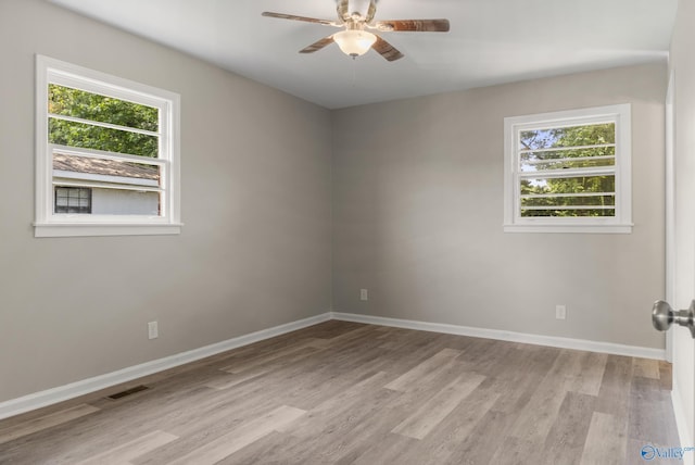 2703 Oakdale Ter, Huntsville, AL 35810 - unfurnished room with plenty of natural light, light wood-style flooring, and ceiling fan