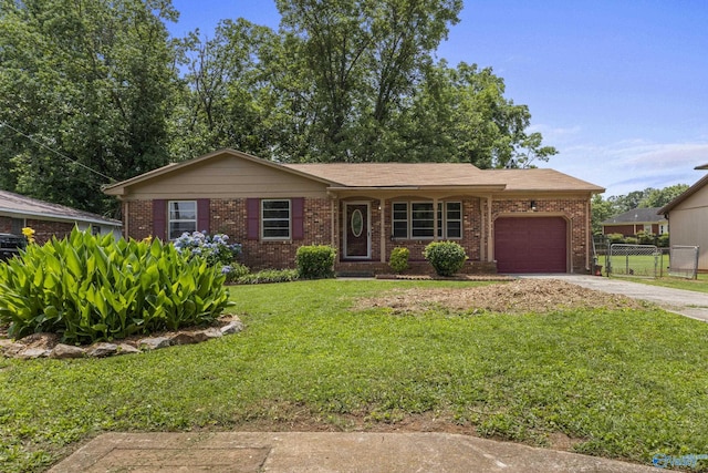 2703 Oakdale Ter, Huntsville, AL 35810 - single story home featuring an attached garage, brick siding, and driveway