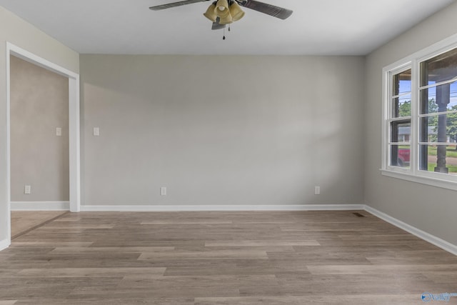 2703 Oakdale Ter, Huntsville, AL 35810 - empty room with ceiling fan and light wood-style floors