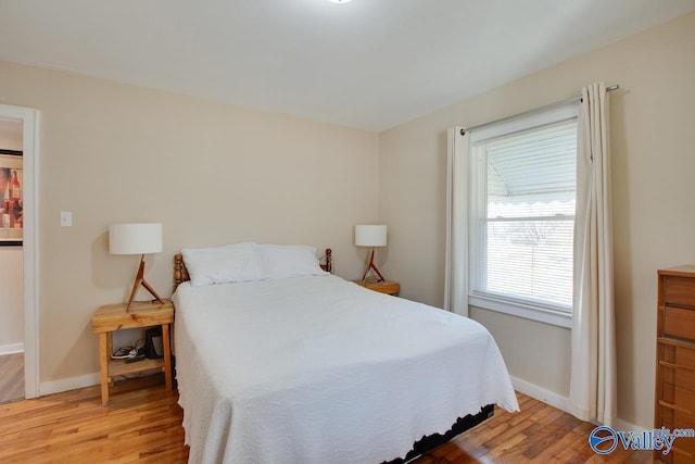 bedroom featuring light hardwood / wood-style flooring