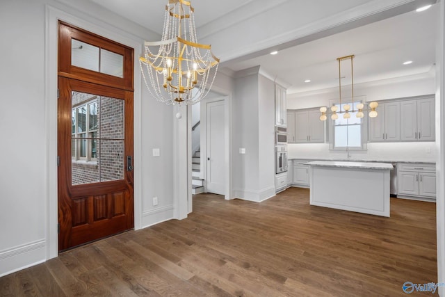 27 Lendon Main St, Huntsville, AL 35802 - interior space featuring stairway, baseboards, an inviting chandelier, and dark wood finished floors