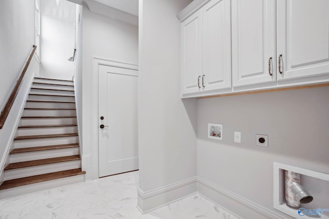 laundry room featuring cabinets, electric dryer hookup, and washer hookup