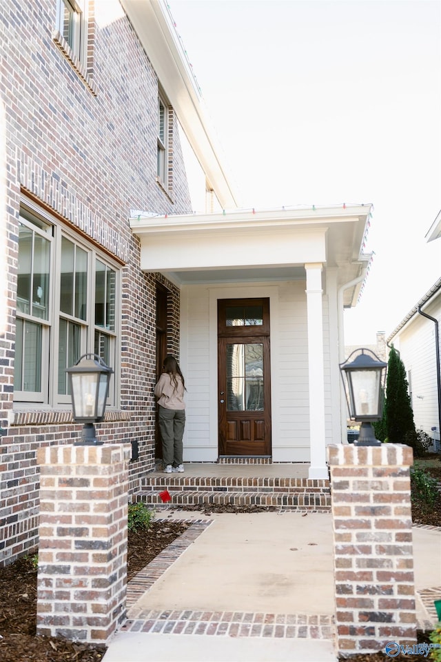 property entrance with a porch