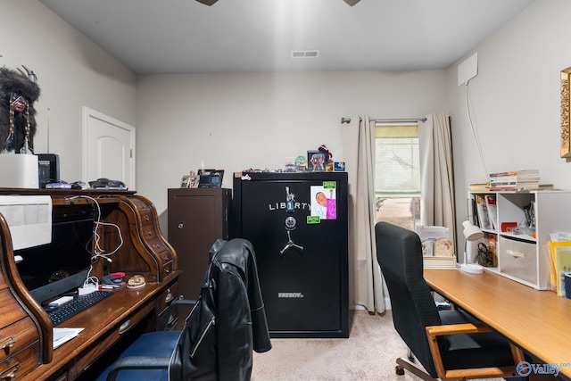 carpeted office space featuring visible vents