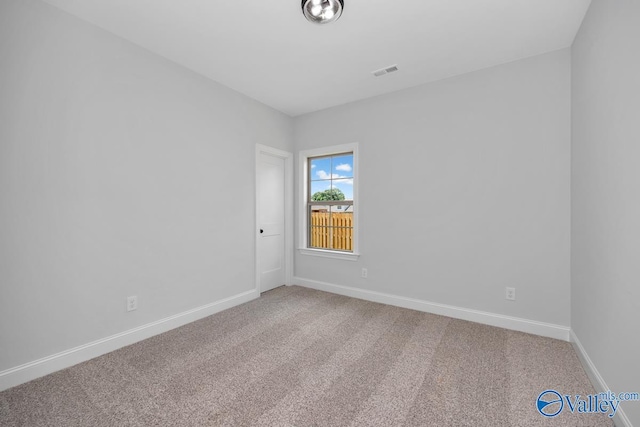 view of carpeted spare room