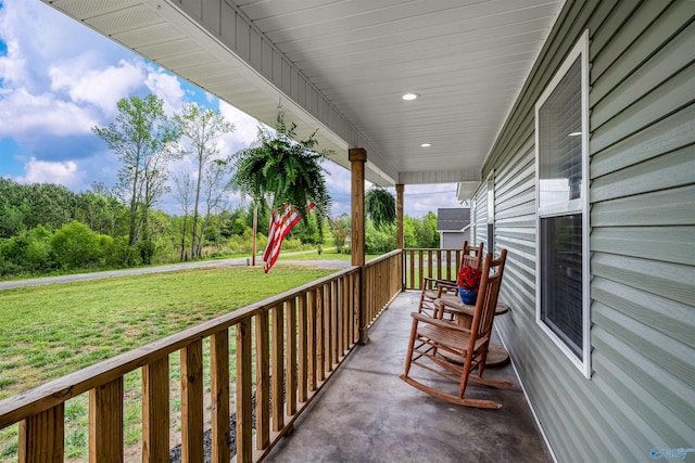 balcony featuring a porch