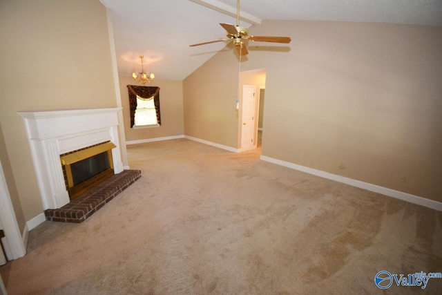 unfurnished living room featuring lofted ceiling with beams, a fireplace, ceiling fan with notable chandelier, and light colored carpet