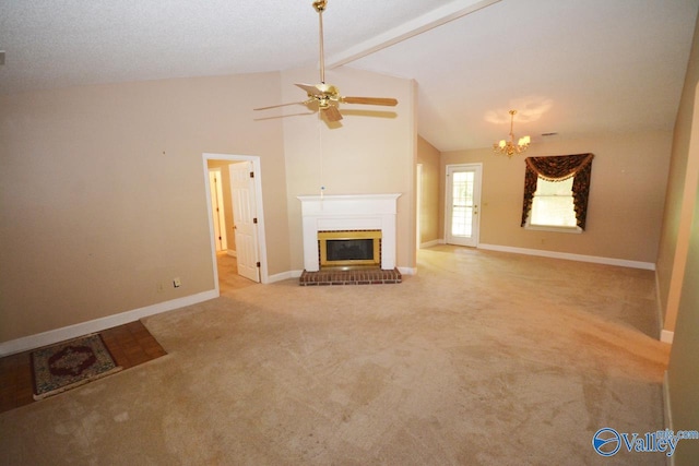 unfurnished living room with beam ceiling, ceiling fan with notable chandelier, a brick fireplace, light carpet, and high vaulted ceiling