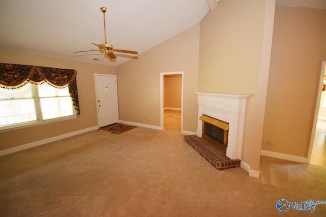 unfurnished living room featuring ceiling fan, high vaulted ceiling, carpet flooring, and a fireplace