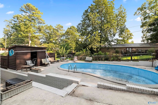 view of pool with a patio area