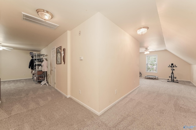 interior space featuring ceiling fan and carpet flooring