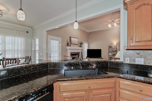 kitchen featuring dark stone counters, ceiling fan, and light brown cabinets