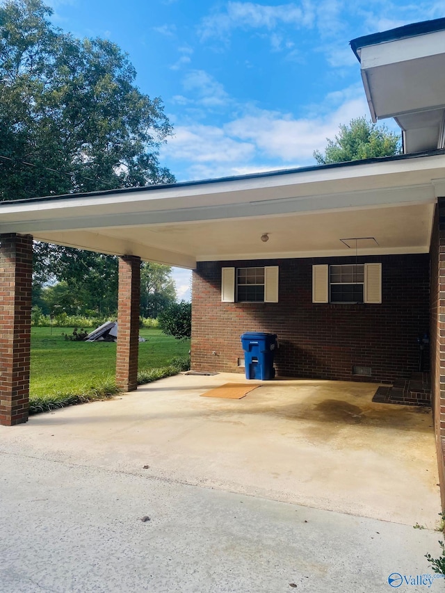 view of parking / parking lot featuring a carport