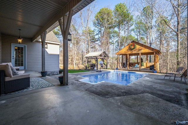 view of pool with a gazebo and a patio