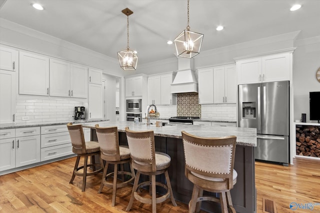 22424 Cantera Dr, Athens, AL 35613 - kitchen featuring stainless steel appliances, ornamental molding, a sink, white cabinets, and recessed lighting