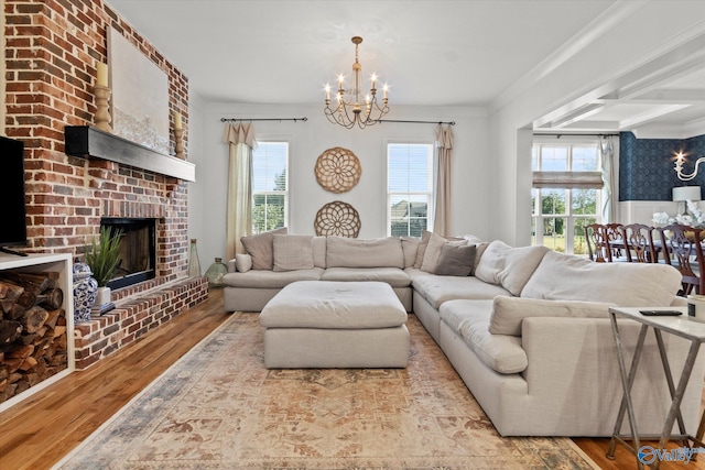 22424 Cantera Dr, Athens, AL 35613 - living area featuring a chandelier, healthy amount of natural light, and wood finished floors