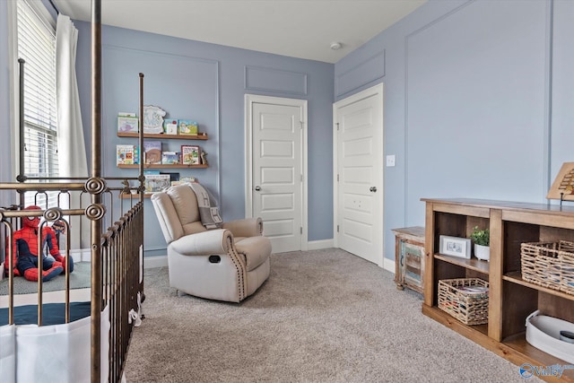 22424 Cantera Dr, Athens, AL 35613 - living area featuring carpet floors, an upstairs landing, and baseboards