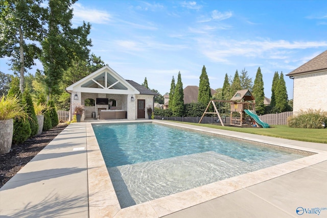 22424 Cantera Dr, Athens, AL 35613 - view of swimming pool with fence, a playground, outdoor lounge area, and a patio