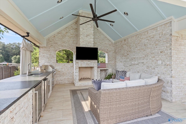 22424 Cantera Dr, Athens, AL 35613 - view of patio featuring a sink, area for grilling, an outdoor living space with a fireplace, ceiling fan, and wine cooler