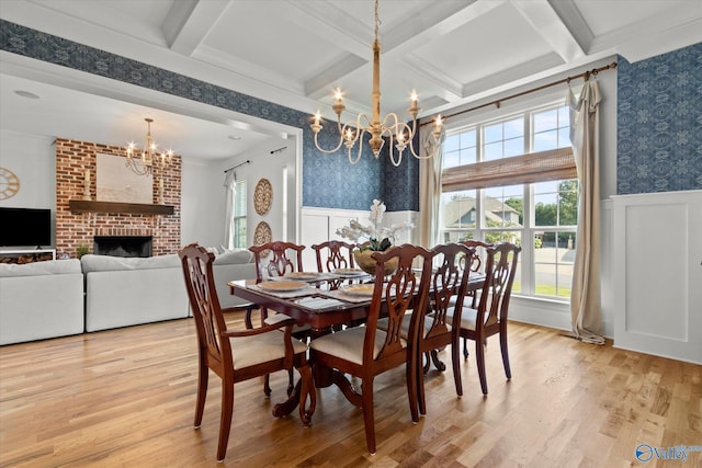 22424 Cantera Dr, Athens, AL 35613 - dining room with a chandelier, wallpapered walls, beamed ceiling, wainscoting, and light wood-style floors