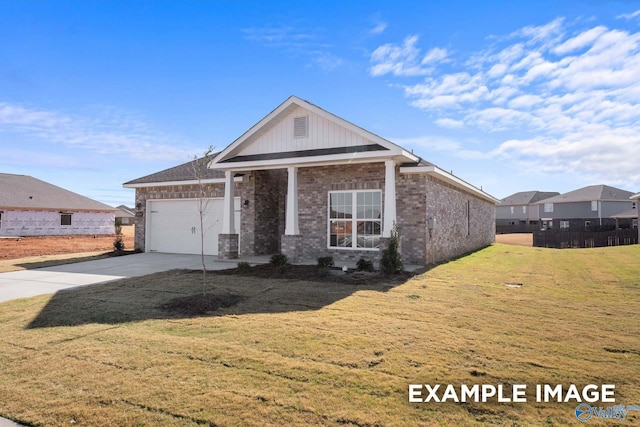 view of front of house featuring driveway, brick siding, an attached garage, fence, and a front yard