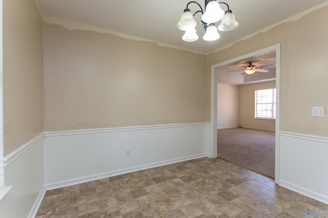 143 Laredo Cir, Huntsville, AL 35811 - spare room featuring a chandelier, ornamental molding, a ceiling fan, and baseboards