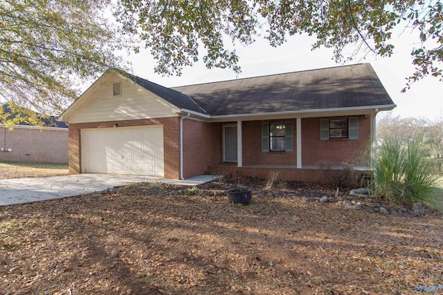 143 Laredo Cir, Huntsville, AL 35811 - ranch-style home with brick siding, a porch, an attached garage, concrete driveway, and a shingled roof