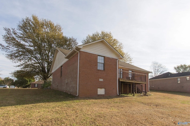 143 Laredo Cir, Huntsville, AL 35811 - rear view of property featuring brick siding, stairway, a yard, and a deck
