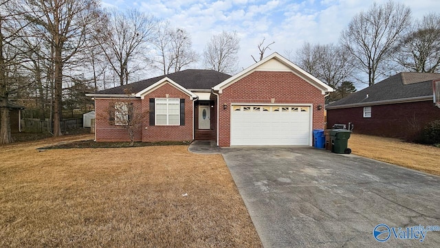 ranch-style home featuring driveway, brick siding, a front lawn, and an attached garage