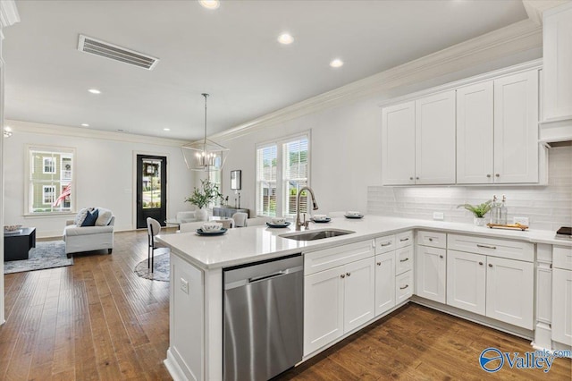 108 Napolean Ave, Madison, AL 35758 - kitchen with stainless steel dishwasher, a sink, open floor plan, ornamental molding, and a peninsula