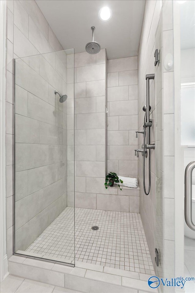 108 Napolean Ave, Madison, AL 35758 - bathroom with a stall shower, recessed lighting, and tile patterned flooring