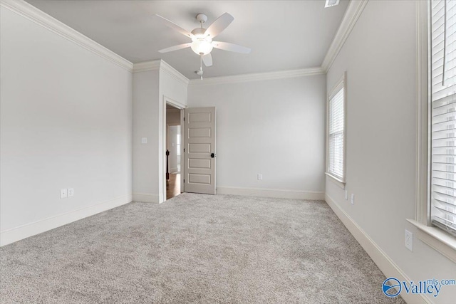 108 Napolean Ave, Madison, AL 35758 - empty room with ornamental molding, plenty of natural light, ceiling fan, carpet floors, and baseboards