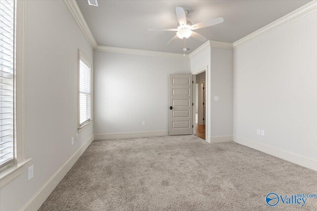 108 Napolean Ave, Madison, AL 35758 - carpeted spare room with a ceiling fan, crown molding, and baseboards