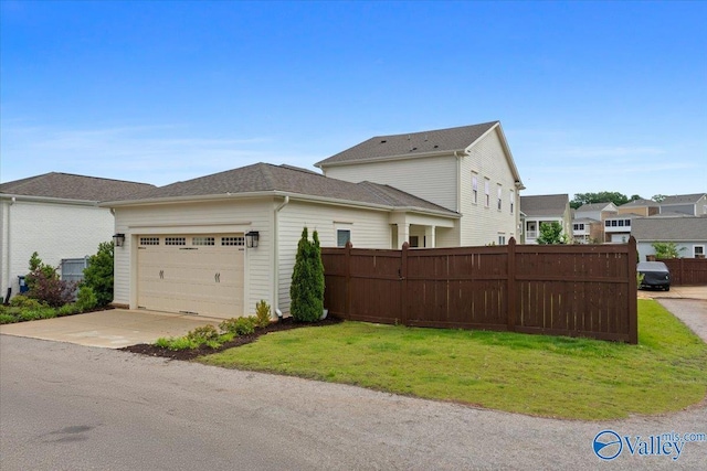 108 Napolean Ave, Madison, AL 35758 - view of side of home with a garage and concrete driveway