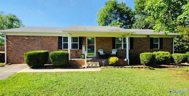 17309 Ferry Rd, Athens, AL 35611 - single story home with a front lawn and brick siding