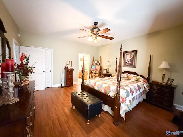 bedroom featuring ceiling fan, baseboards, and wood finished floors