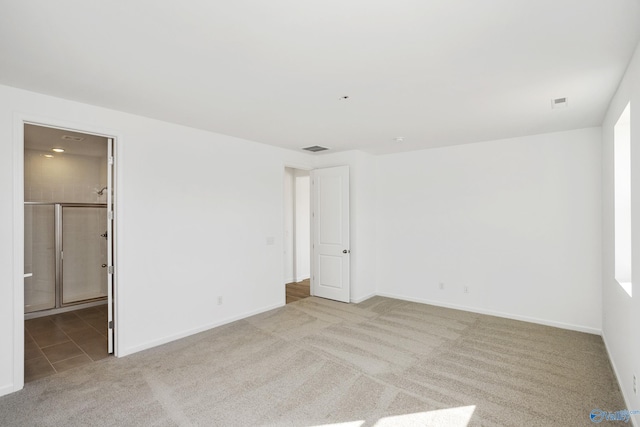139 Jude Ln, Hazel Green, AL 35750 - unfurnished bedroom with carpet floors, baseboards, and connected bathroom