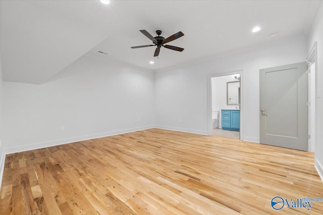 unfurnished bedroom featuring light wood finished floors, recessed lighting, and baseboards