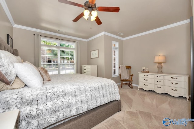 bedroom with a ceiling fan, baseboards, crown molding, and light colored carpet