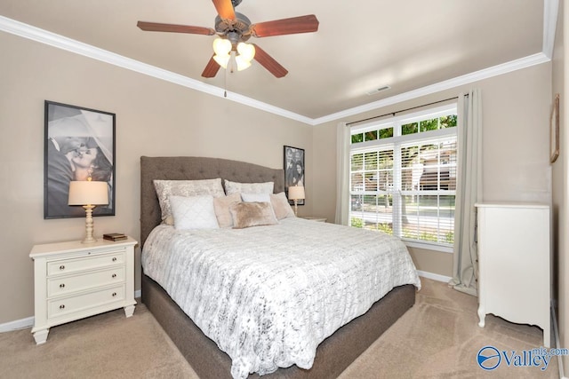 bedroom with baseboards, ornamental molding, and light colored carpet