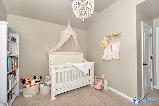 carpeted bedroom with a nursery area, lofted ceiling, baseboards, and an inviting chandelier