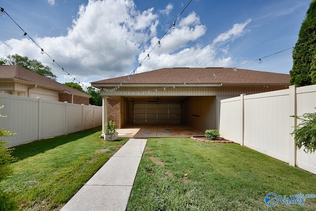 view of yard with a fenced backyard