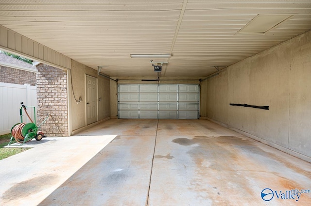 garage featuring a garage door opener