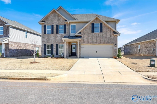 view of front of property featuring concrete driveway, an attached garage, brick siding, and board and batten siding