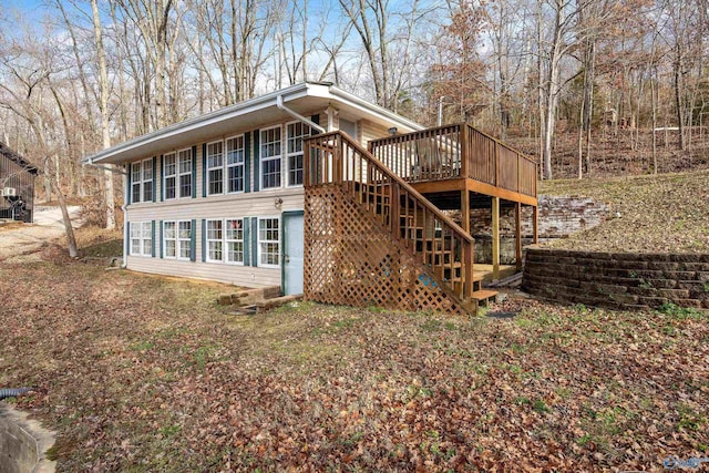 view of home's exterior featuring a deck