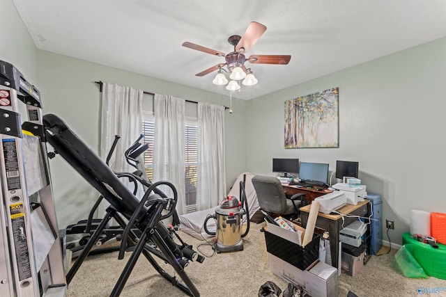 office featuring light carpet and ceiling fan