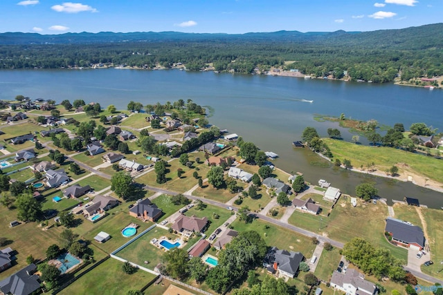 bird's eye view featuring a water and mountain view